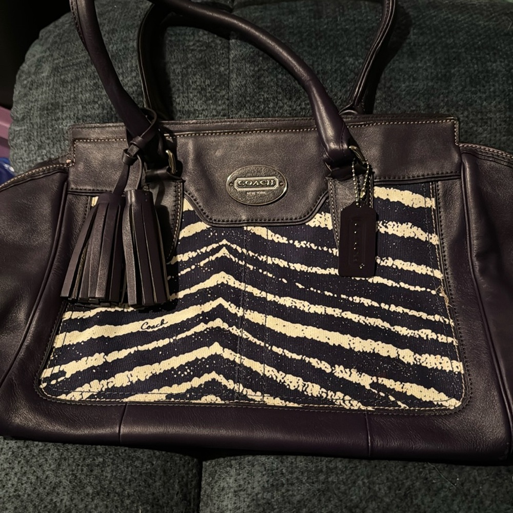 Purple Coach leather bag